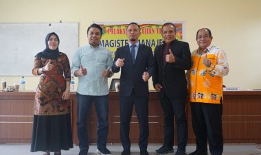 Sandang Gelar MM dari Pascasarjana Unilak, Agung Nugroho Lulus Sidang Tesis dengan Nilai A