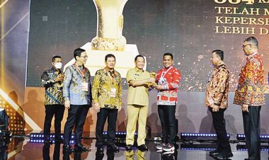 Bikin 97,7 Masyarakat Dapat Jaminan Kesehatan,  Pemkab Pelalawan Dapat Penghargaan UHC