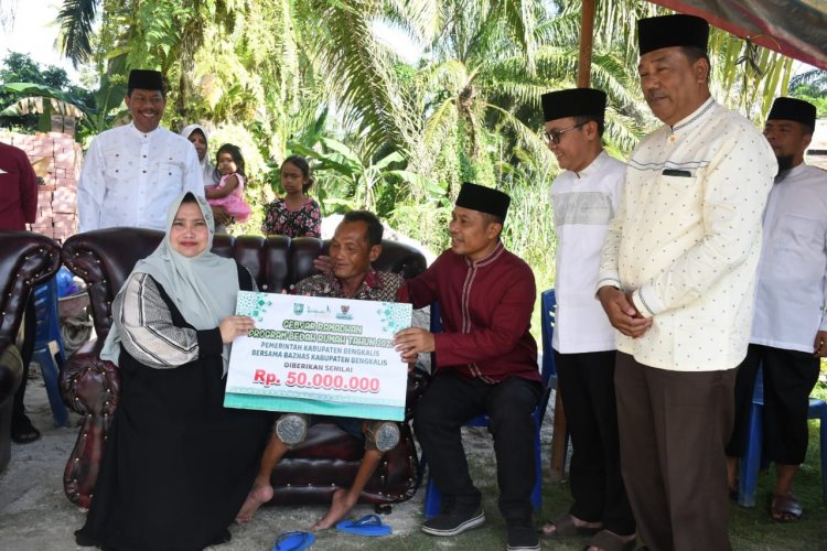 Bupati Kasmarni Apresiasi Program Bedah Rumah Baznas