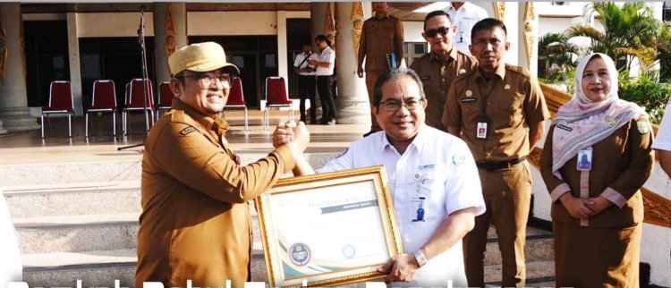 Capaian UHC 97, 42 Persen, Pemkab Rohul Terima Penghargaan dari BPJS Kesehatan Wilayah II